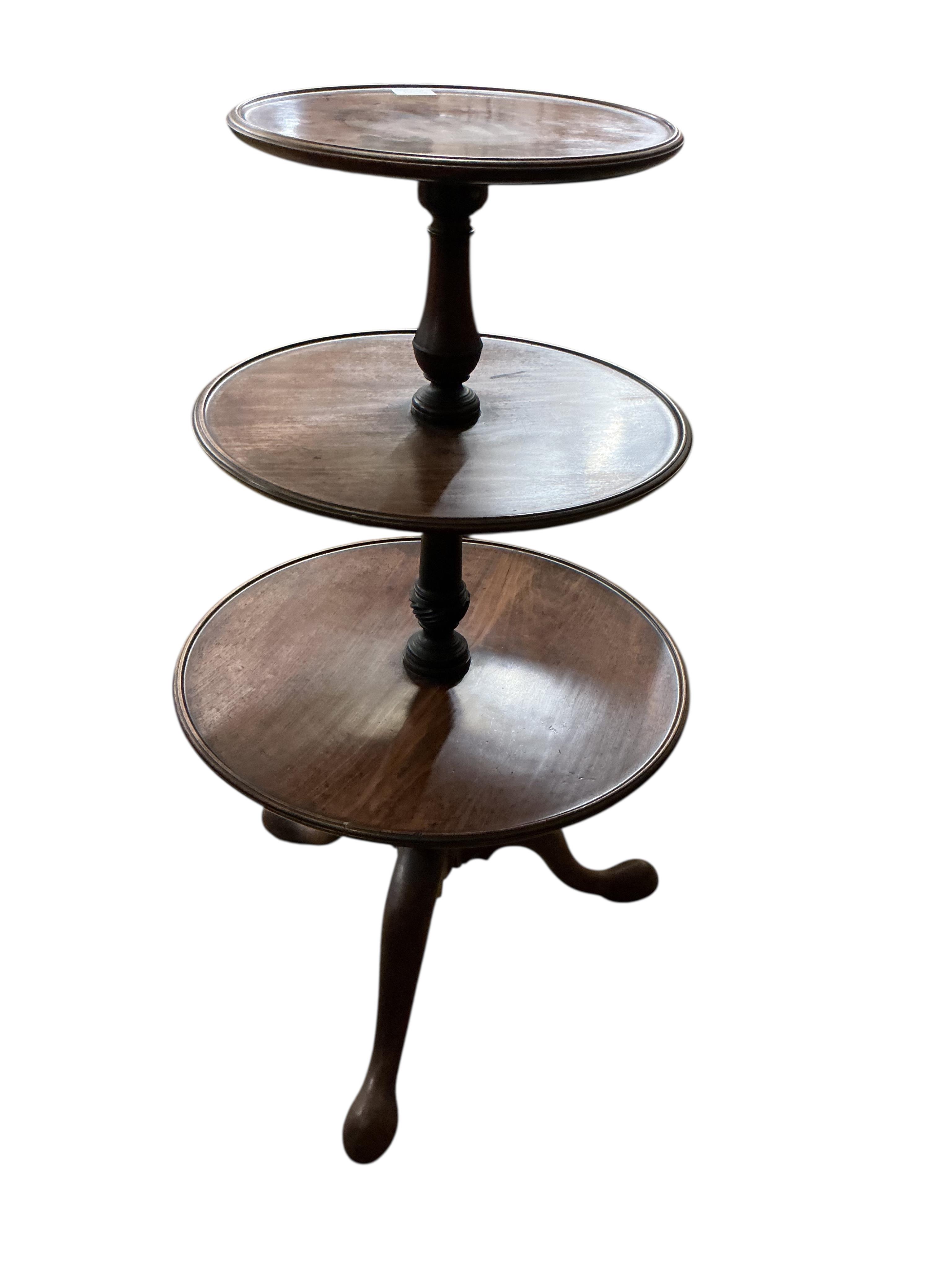 A George III mahogany three tier whatnot, height 106cm